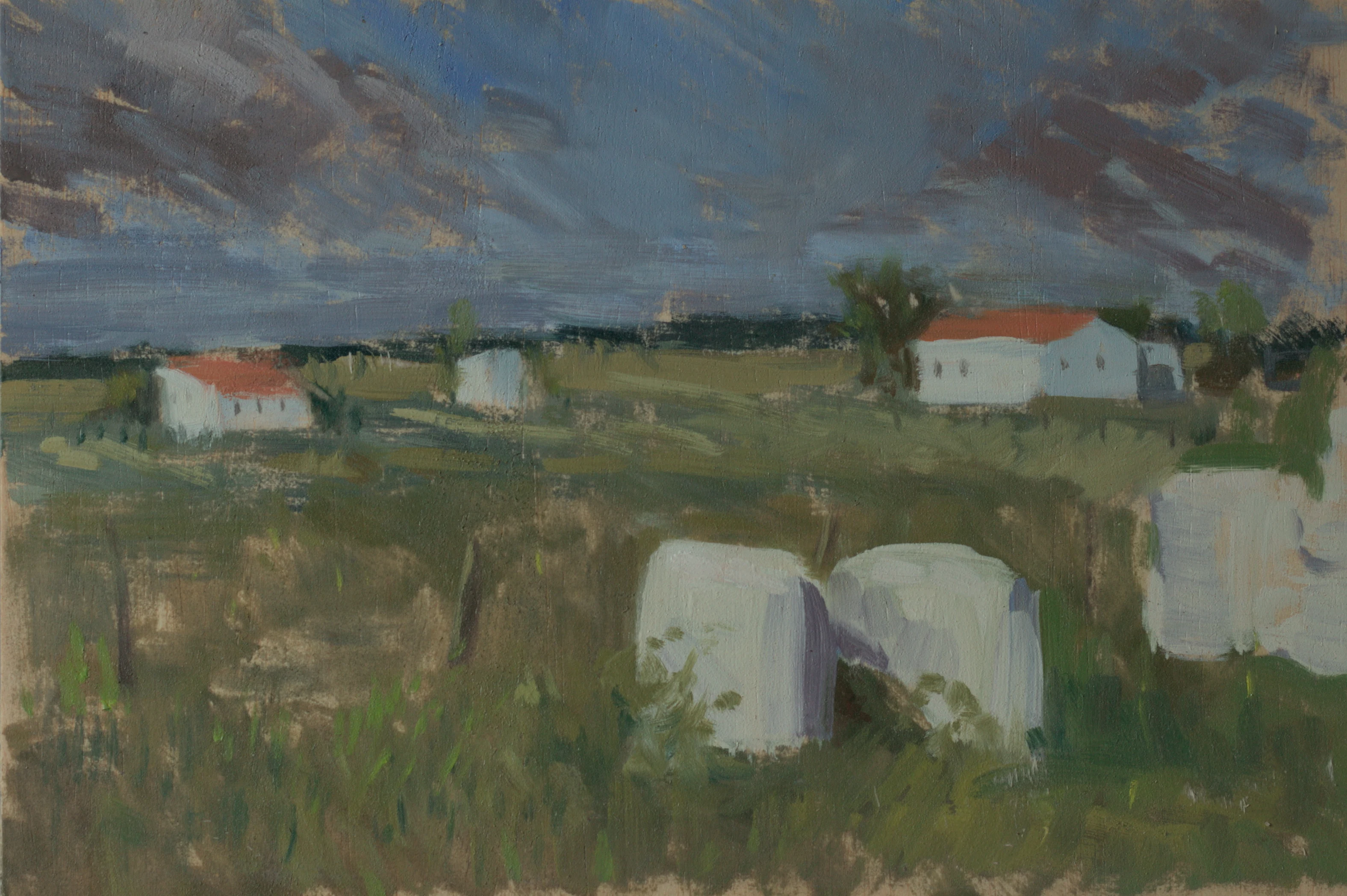 Pintura impressionista de uns fardos de palha embalados em Samora Correia